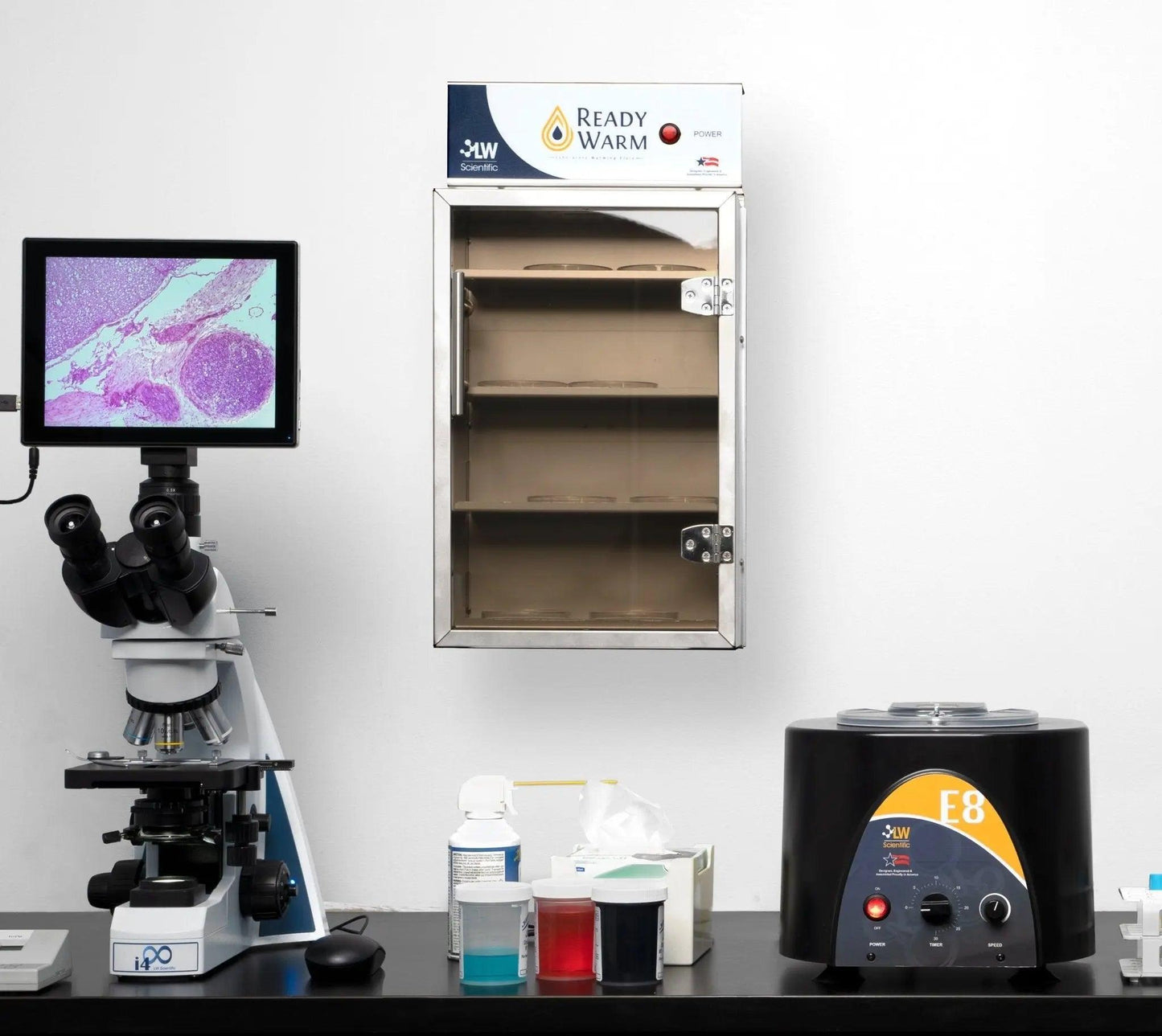 Ready Warm Wall Incubator mounted in lab next to microscope and centrifuge